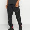 Jordan ZION WILLIAMSON PANT - Pantalon de survêtement Prix Allégé vêtements basket-ball homme -Jordan Soldes Boutique 0bc72103529b471291c6649345be054f