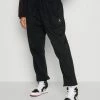 Jordan Meilleure qualité PANT CORE - Pantalon de survêtement pantalons haute femme -Jordan Soldes Boutique 5196876b08ed49aea292868d0774a755
